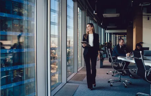 Business professionals in a bright, open office