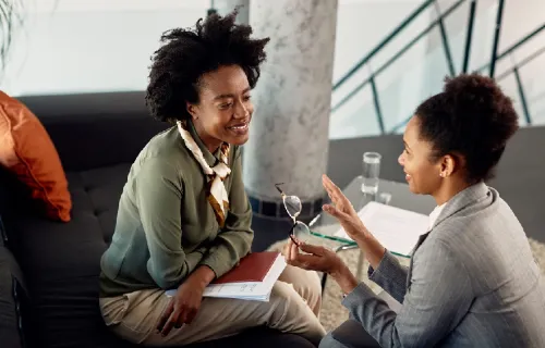 Two colleagues having a payments conversation