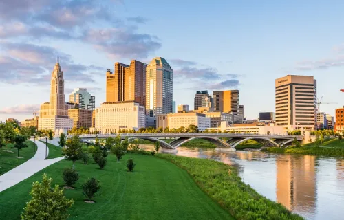 kyline of Columbus, Ohio from Bicentennial Park bridge at Night