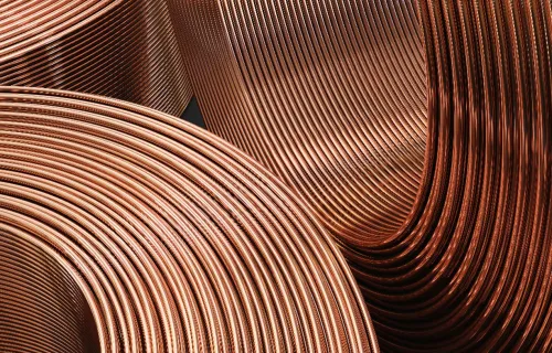 Close-up of coiled copper wire rolls