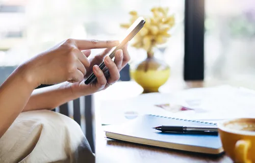 A person working on a mobile device