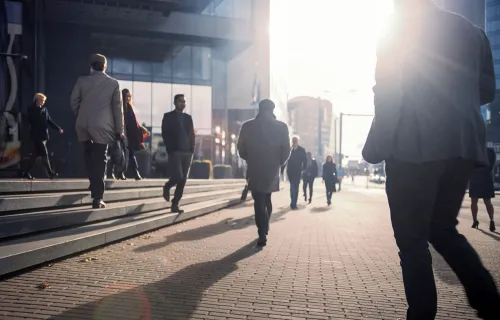 People walking through a city