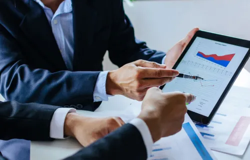 People looking at tablet