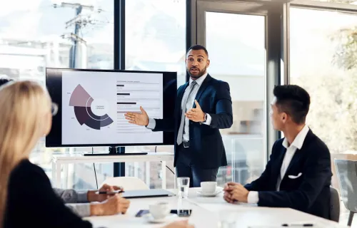colleague presenting data on charts