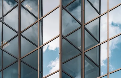 sky reflected on building windows