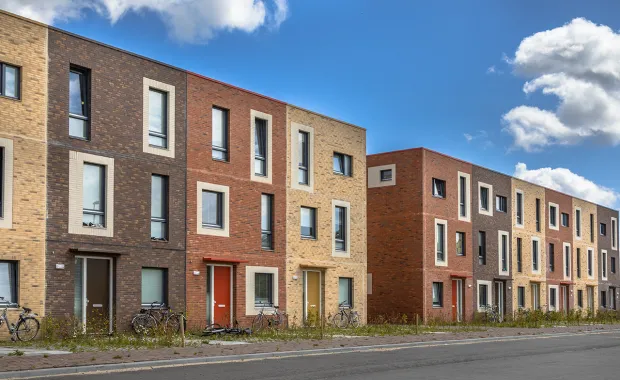 sun shining on townhouses