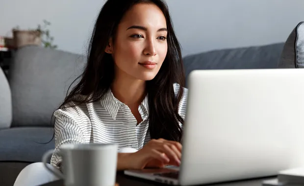 Professional working in her laptop