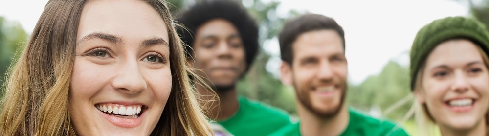 Volunteers smiling Volunteers smiling